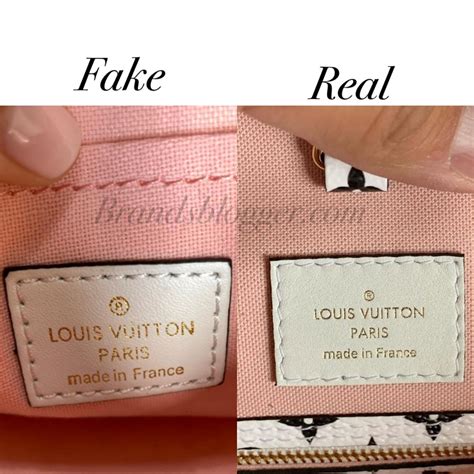 how to tell between fake louis vuitton and real|authentic louis vuitton stamp.